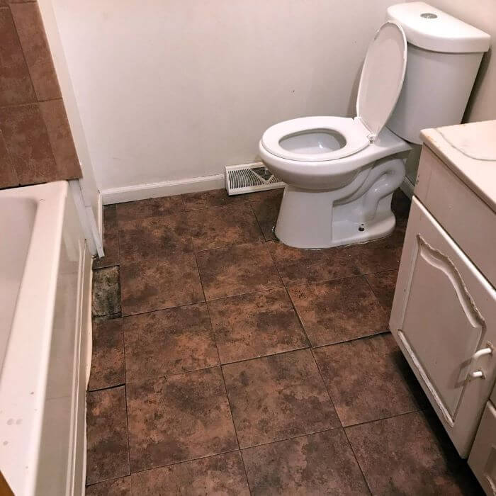 A dirty bathroom that a tenant was living in before I purchased the property.
